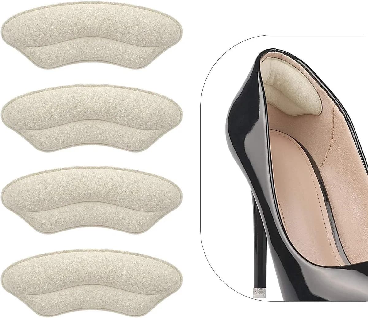 beige heel grips for loose shoes, 4 pairs, shown inside a high heel