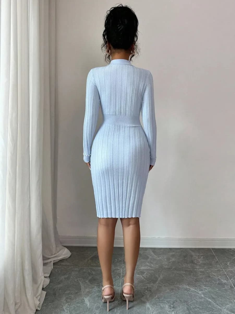 back view of the light blue ribbed knit midi dress with long sleeves