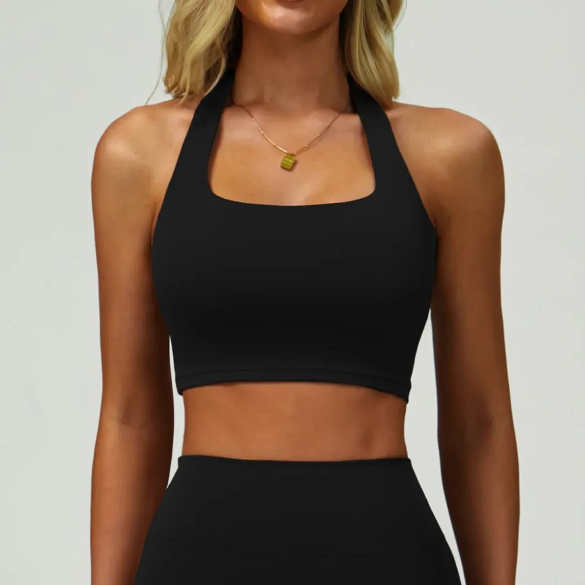 black halter sports bra from the 3 piece activewear set