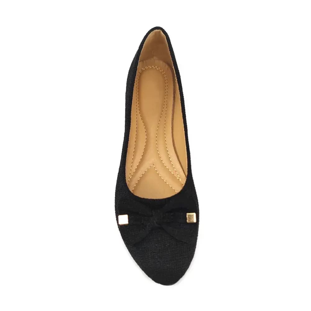 top view of a black woven texture ballet flat with bow and cushioned footbed