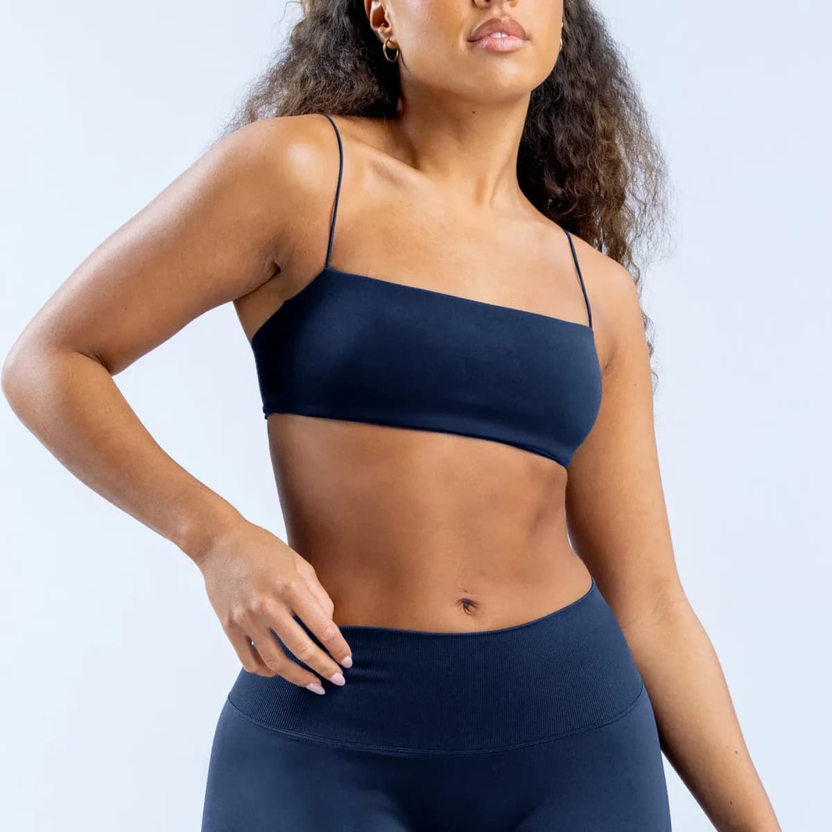 navy blue strappy sports bra from the seamless 4 piece activewear set