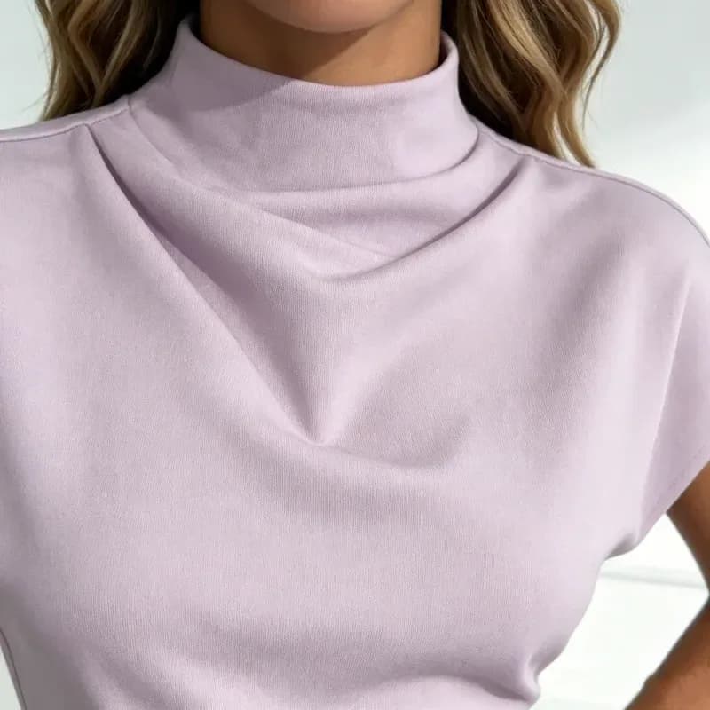 close view of the draped mock neck on a lavender office blouse