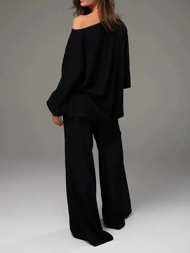 black lounge set with off the shoulder oversized top and wide leg pants