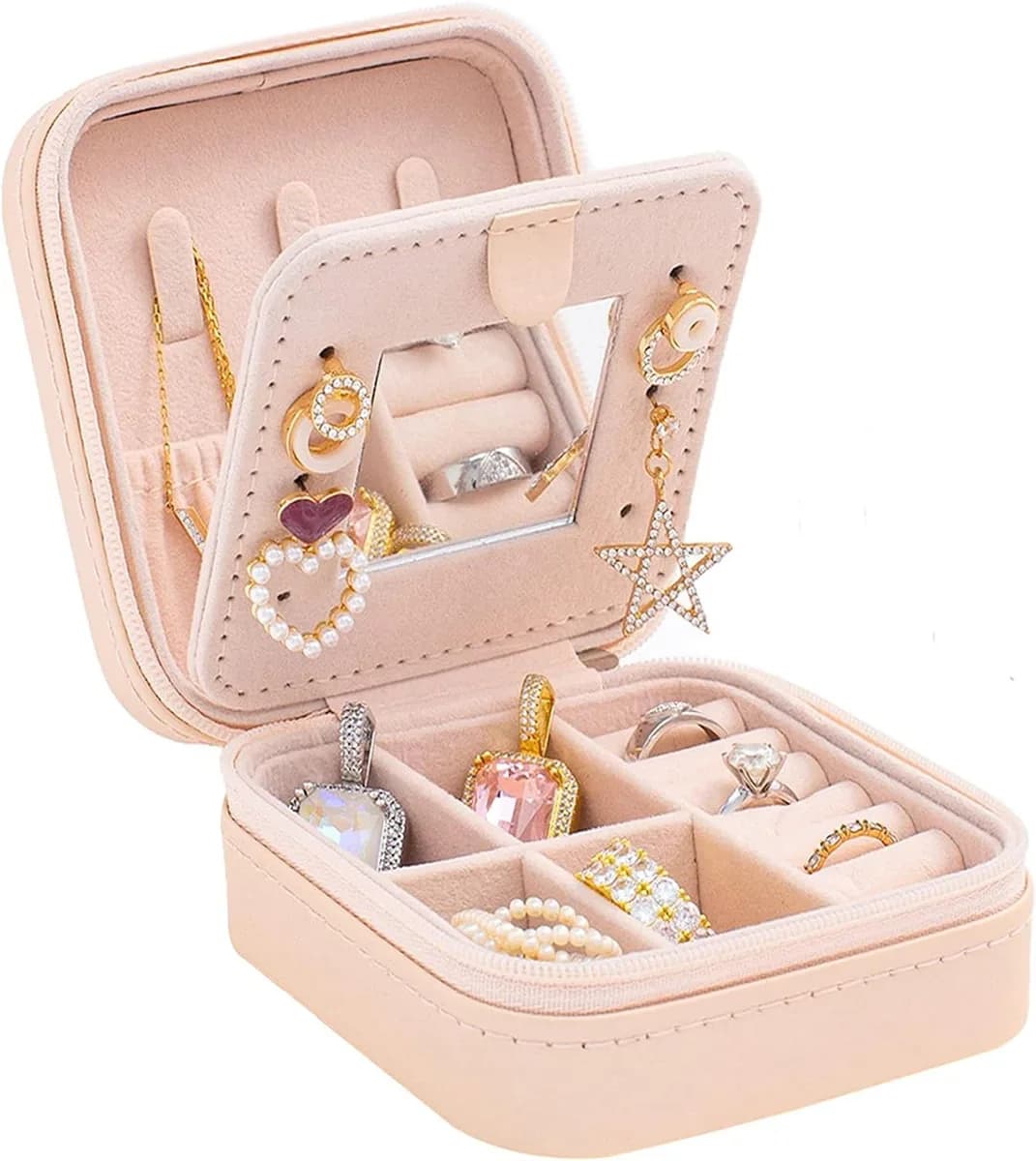 open mini travel jewelry box with mirror in pink holding rings and earrings