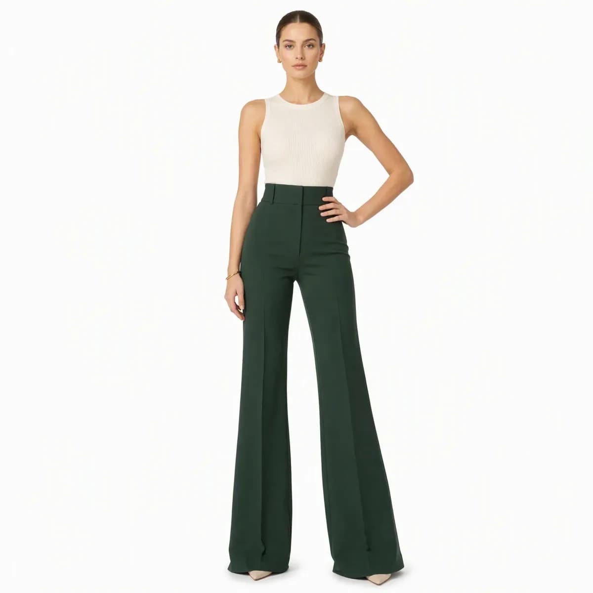 tall woman wearing dark green high waisted flare pants
