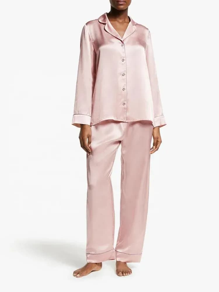 blush pink satin pajama set with long sleeve button up shirt and pants